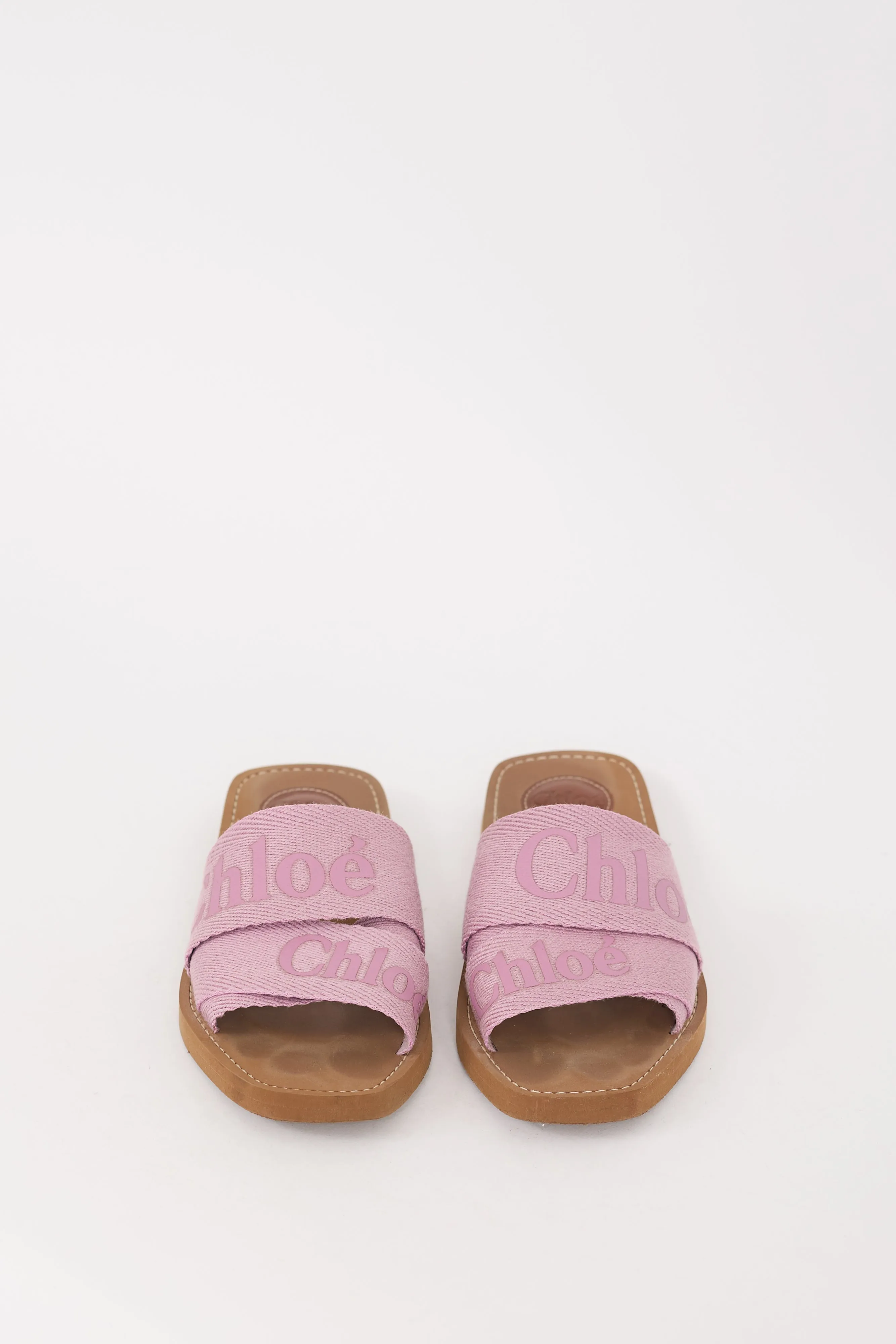 Brown & Pink Woody Logo Slide